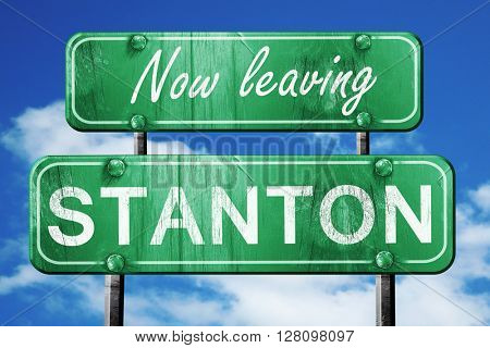 Leaving stanton, green vintage road sign with rough lettering