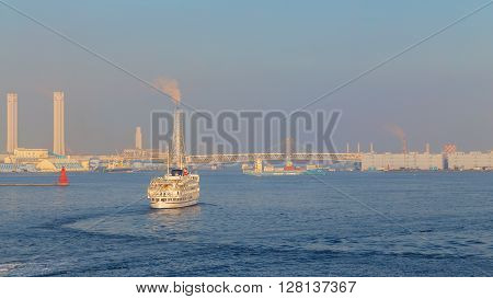 YOKOHAMA JAPAN - NOVEMBER 24 2015: Yokohama Port has 10 major piers. In 2013 the Port served 37706 ships. It handled 271276977 tons of cargo and 2888220 TEU containers