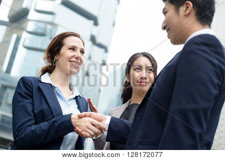 Business people hand shake
