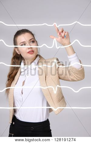 Doctor woman working with cardiogram lines