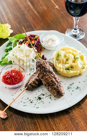 kebab with mashed potatoes