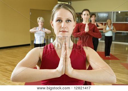 Prime adult female Caucasians in yoga class.
