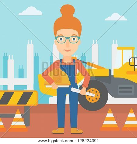 Engineer with hard hat and blueprint.