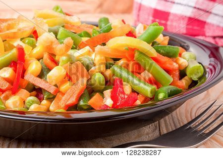 Mexican Mix of Vegetables. Tomatoes, Beans, Celery Root, Green Beans, Peas, Corn. Dietary Food.