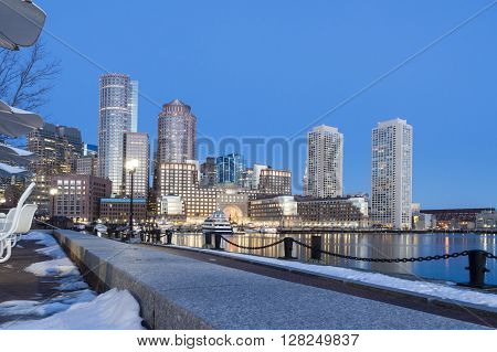 Sun lights Rowes Wharf on winter morning along Boston waterfront