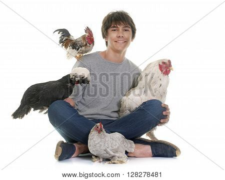 teen and chicken in front of white background