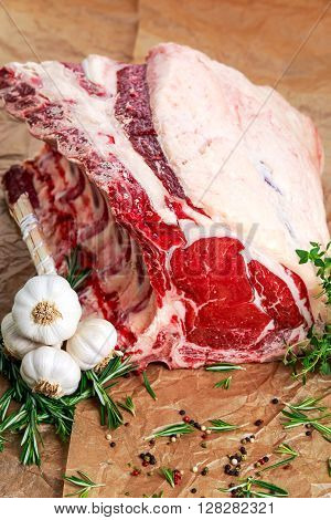 Fresh Raw Beef bone rib roughly choppid. with herbs and seasoning