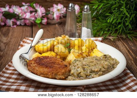 Delicious Meal Of Minced Meat Cutlet, Potatoes And Fried Cabbage.