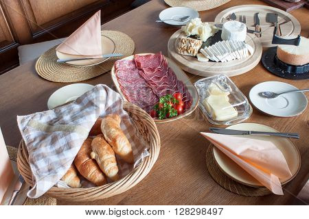 Homework healthy breakfast. Diet food. Breakfast for children. Well-laid wooden table.