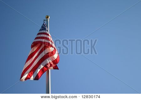 An American Flag Hangs In the Morning Sun