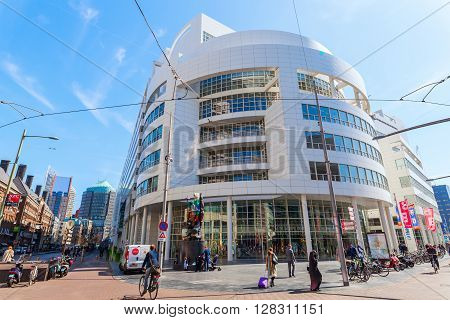 The Hague Netherlands - April 21 2016: New City Hall of The Hague with unidentified people. It was designed in 1986 by American architect Richard Meier and completed in 1995