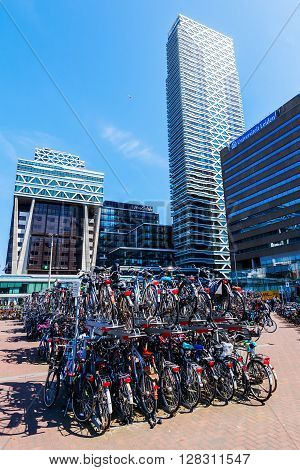 The Hague Netherlands - April 21 2016: forecourt of the main station with unidentified people. It is with twelve tracks the largest terminal station in the Netherlands. It was completed in 1973