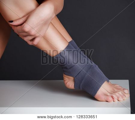 Close-up portrait of beautiful women feet with yoga socks