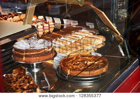 STRASBOURG FRANCE - JAN 20 2016: French traditional bakery pastry store in the center of Strabourg with diverse cakes and eclairs