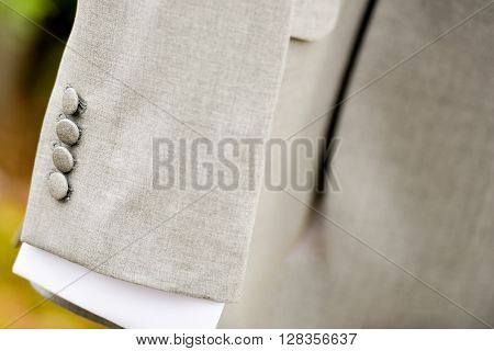 Sleeve gray suit coat in natural light