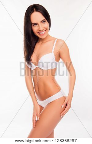 Beautiful Young Lady In Underwear Posing  On White Background