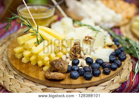 Still life photo with Georgian cheese apple grape etc