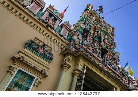 Intricate carvings of hindu deities over entrance of oldest Hindu temple in Malaysia, Sri Mahamariamman Temple, Little India in historic George Town, Penang.