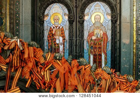 Russia Kronstadt May 3 2016: The image of Saints on the facade of the Kronstadt Cathedral.