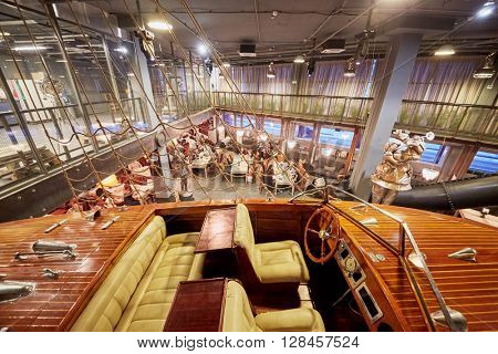 MOSCOW, RUSSIA - FEB 15, 2015: People in art-cafe Rukav. Rukav is a simultaneous association of art workshops, cafes and exhibition of sculptures of famous sculptor A. Rukavishnikov.