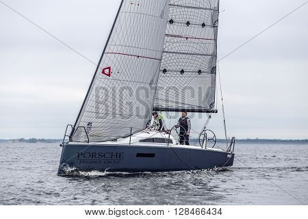 KYIV, UKRAINE - APRIL 26, 2016: Traning on the new model of yacht OceanTECH L30 on the Kyiv water reservoir or Kyiv SEA with Rodion Luka, L30 idea author, Silver medalist.