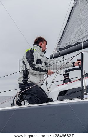 KYIV, UKRAINE - APRIL 26, 2016: Traning on the new model of yacht OceanTECH L30 on the Kyiv water reservoir or Kyiv SEA with Rodion Luka, L30 idea author, Silver Olympic medalist.