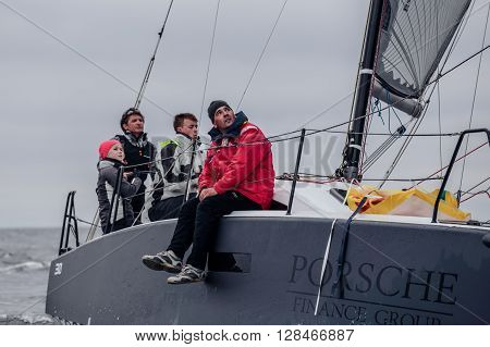 KYIV, UKRAINE - APRIL 26, 2016: Traning on the new model of yacht OceanTECH L30 on the Kyiv water reservoir or Kyiv SEA with Rodion Luka, L30 idea author, Silver Olympic medalist.