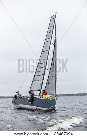KYIV, UKRAINE - APRIL 26, 2016: Traning on the new model of yacht OceanTECH L30 on the Kyiv water reservoir or Kyiv SEA with Rodion Luka, L30 idea author, Silver Olympic medalist.