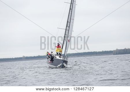 KYIV, UKRAINE - APRIL 26, 2016: Traning on the new model of yacht OceanTECH L30 on the Kyiv water reservoir or Kyiv SEA with Rodion Luka, L30 idea author, Silver Olympic medalist.