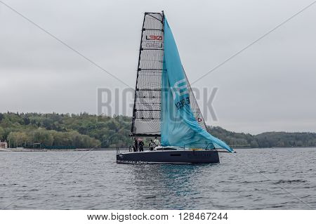 KYIV, UKRAINE - APRIL 26, 2016: Traning on the new model of yacht OceanTECH L30 on the Kyiv water reservoir or Kyiv SEA with Rodion Luka, L30 idea author, Silver Olympic medalist.