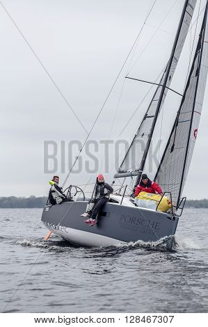 KYIV, UKRAINE - APRIL 26, 2016: Traning on the new model of yacht OceanTECH L30 on the Kyiv water reservoir or Kyiv SEA with Rodion Luka, L30 idea author, Silver Olympic medalist.