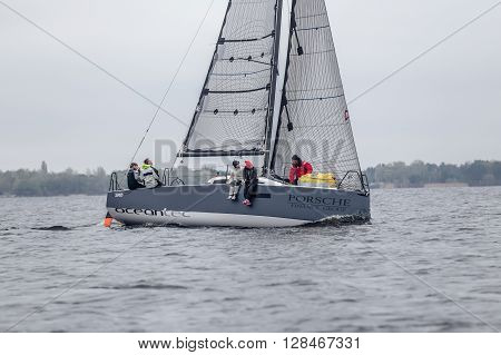 KYIV, UKRAINE - APRIL 26, 2016: Traning on the new model of yacht OceanTECH L30 on the Kyiv water reservoir or Kyiv SEA with Rodion Luka, L30 idea author, Silver Olympic medalist.