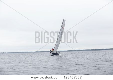 KYIV, UKRAINE - APRIL 26, 2016: Traning on the new model of yacht OceanTECH L30 on the Kyiv water reservoir or Kyiv SEA with Rodion Luka, L30 idea author, Silver Olympic medalist.