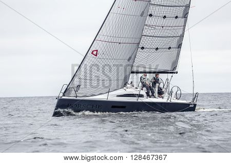 KYIV, UKRAINE - APRIL 26, 2016: Traning on the new model of yacht OceanTECH L30 on the Kyiv water reservoir or Kyiv SEA with Rodion Luka, L30 idea author, Silver Olympic medalist.