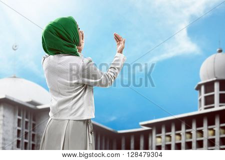 Back View Of Muslim Woman Praying