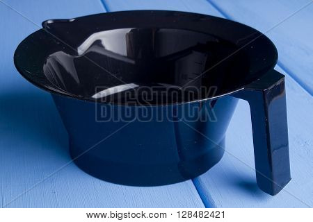 Barber Tools for hair coloring on a wooden background