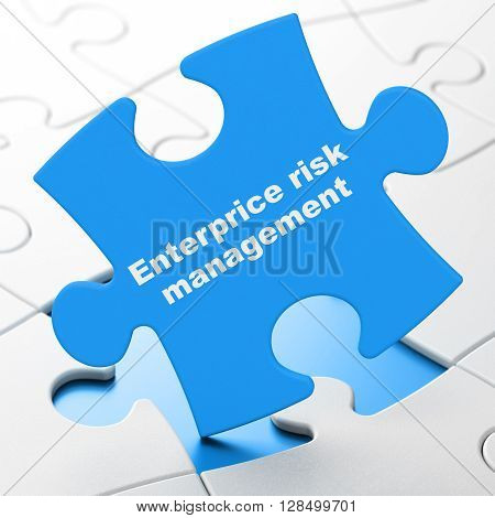 Business concept: Enterprice Risk Management on Blue puzzle pieces background, 3D rendering