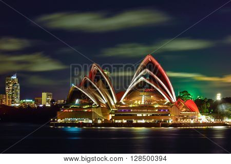 Long exposure of SYDNEY AUSTRALIA - August, 8, 2016: View of Sydney Opera House and with red light celebrate chainese new year in Sydney Australia Over 10 millions tourists visit Sydney every year