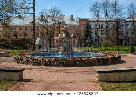 Narva Estonia. Fountain in the town square near the Narva Castle. On the other hand you see the houses of the street Malmi.