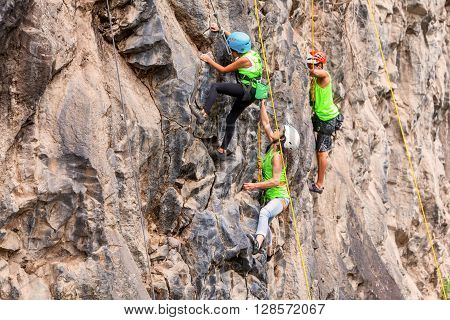 Banos Ecuador - 30 November 2014: Basalt Challenge Of Tungurahua Group Of Brave Climbers Climbing A Rock Wall In Banos On November 30 2014