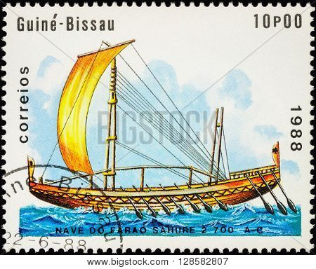 MOSCOW RUSSIA - MAY 01 2016: A stamp printed in Guinea-Bissau shows image of ancient Egyptian boat during Sahure Pharaoh series 