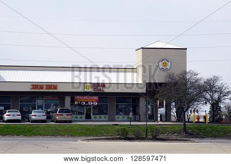 NAPERVILLE, ILLINOIS / UNITED STATES - APRIL 18, 2015: People may eat at the Chataka Masti Indian Grill, and shop for groceries at the Zem Zem Market, in Naperville.