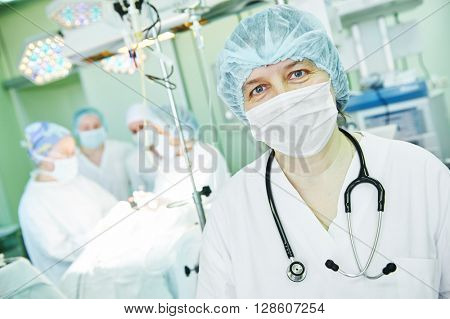 female surgeon anaesthetist at child operating room