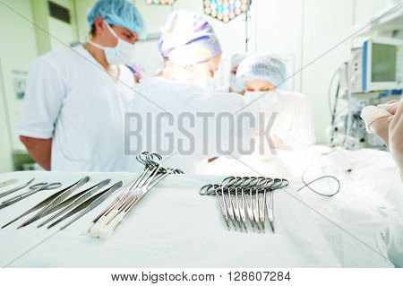 surgery and surgical tools at surgion operation in hospital 
