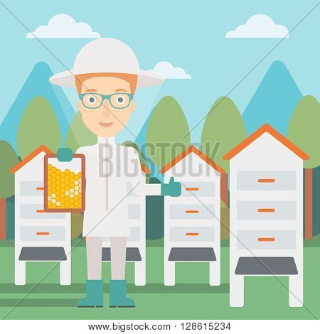 Bee-keeper at apiary.