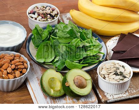 Foods High In Magnesium On A Wooden Table.