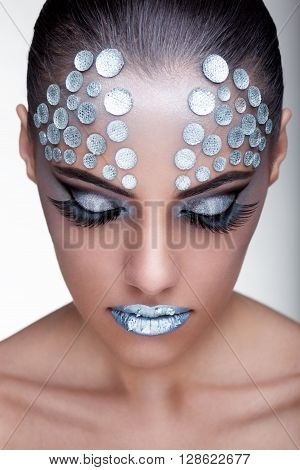 Woman Wearing Fashion Make Up With Rhinestone