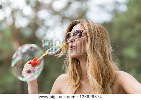 Blowing Soap Bubbles