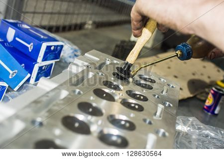 Hands Repairing A Car Engine With A Wrench