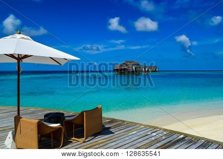 Maldives island - sandy beach and indian ocean